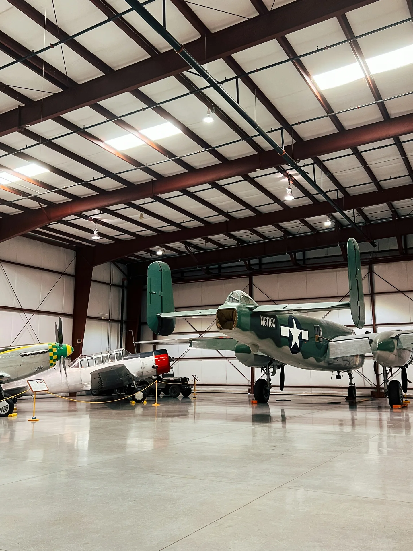 high-gloss concrete hangar floor with a vintage aircraft in Gatineau