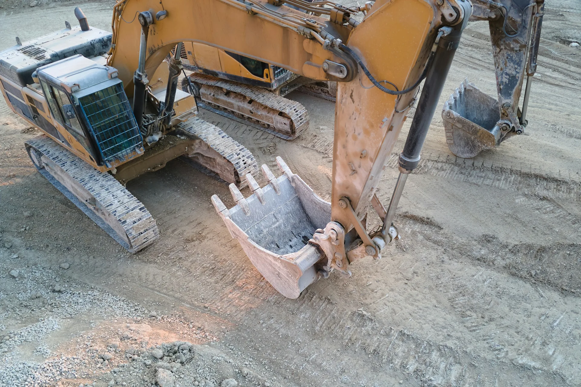 excavator working on a heavy-equipment concrete pad in Gatineau