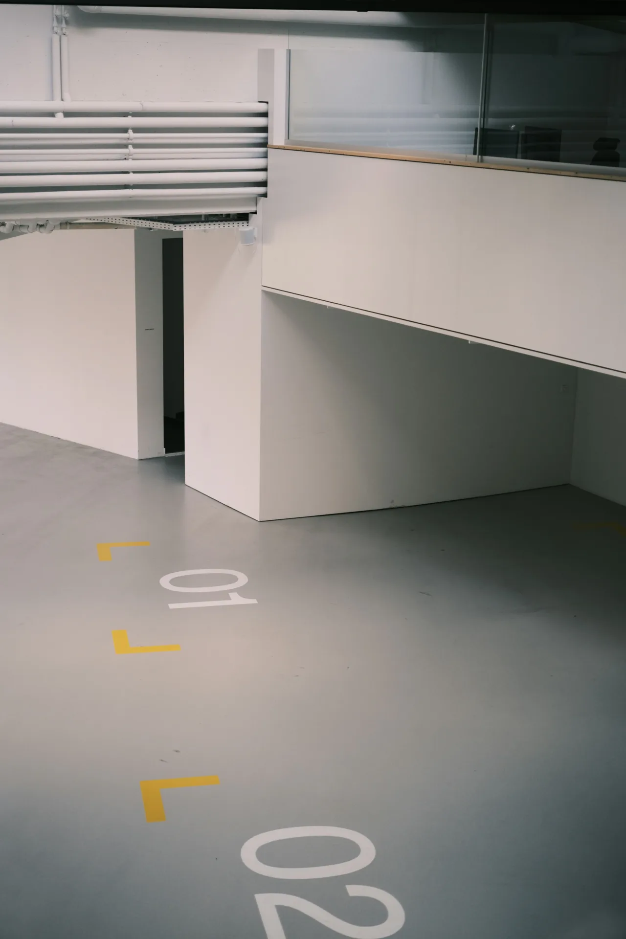 coated warehouse floor with line marking in a Gatineau facility