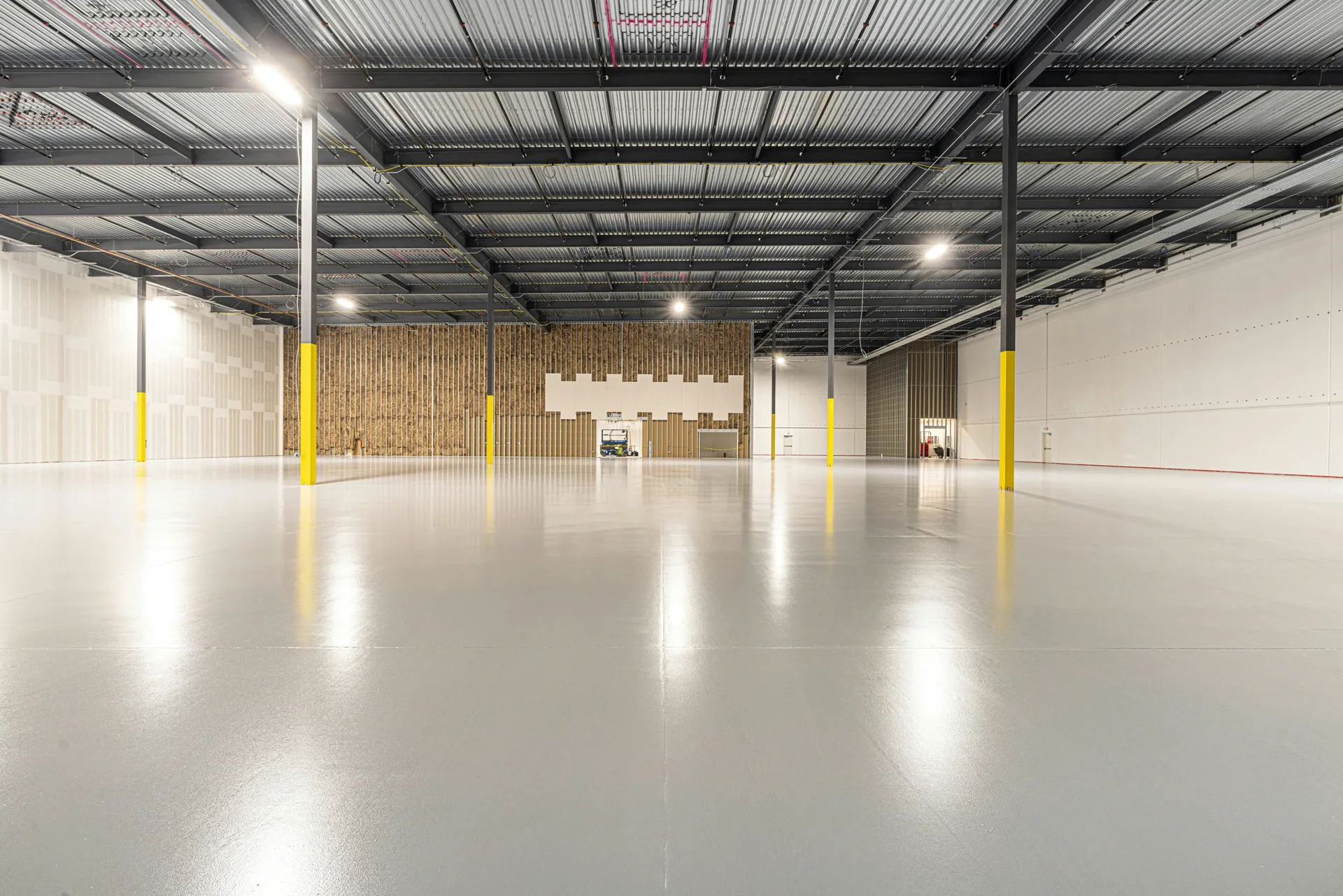warehouse coating install phased zone by zone in Gatineau