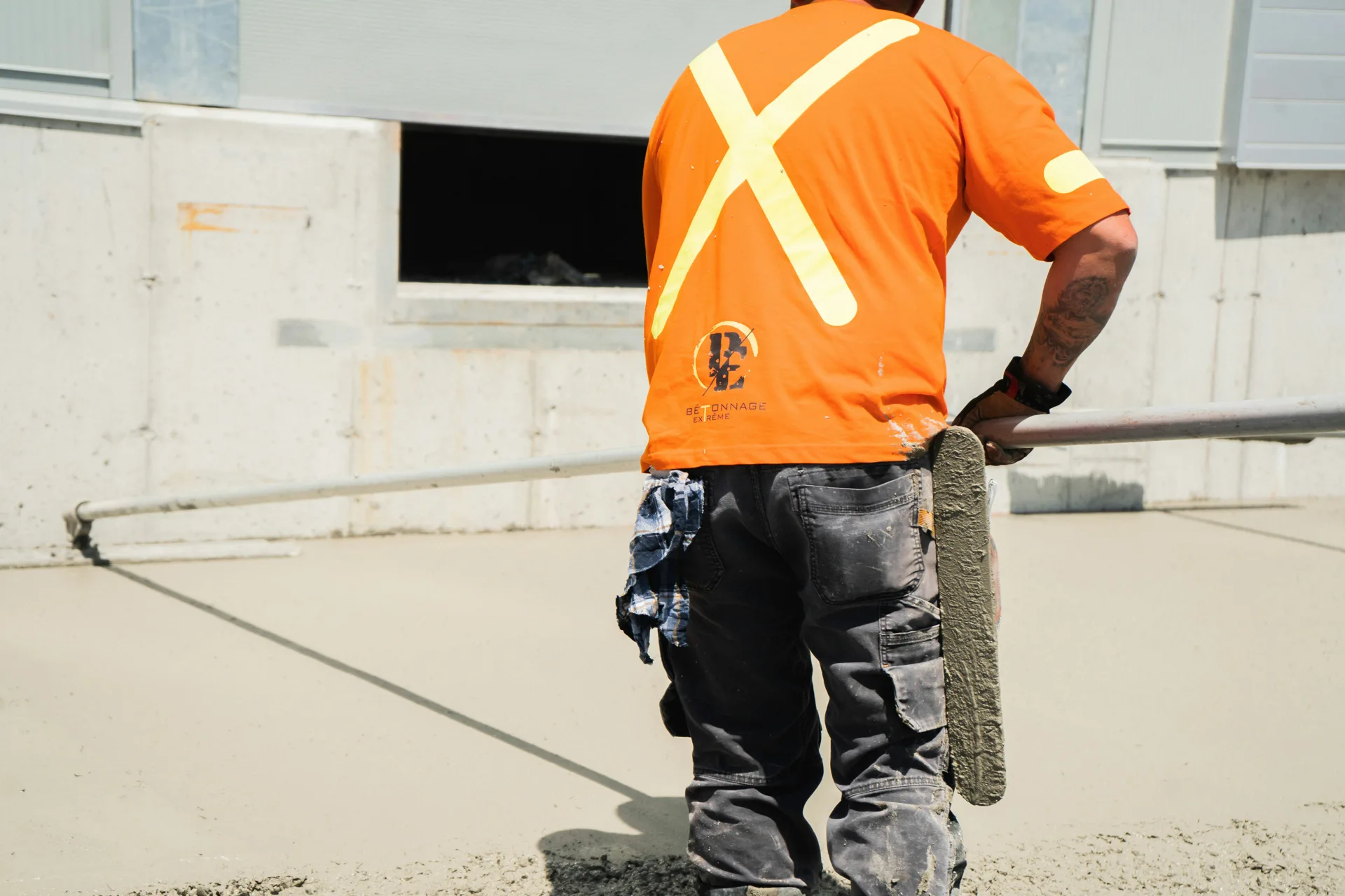 finisher working an Ardex application on a Gatineau floor