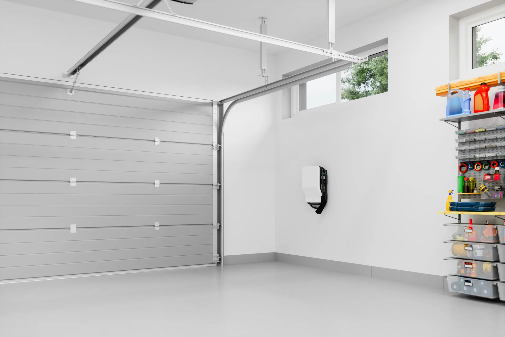 epoxy-coated garage floor with an EV charger at a Gatineau home