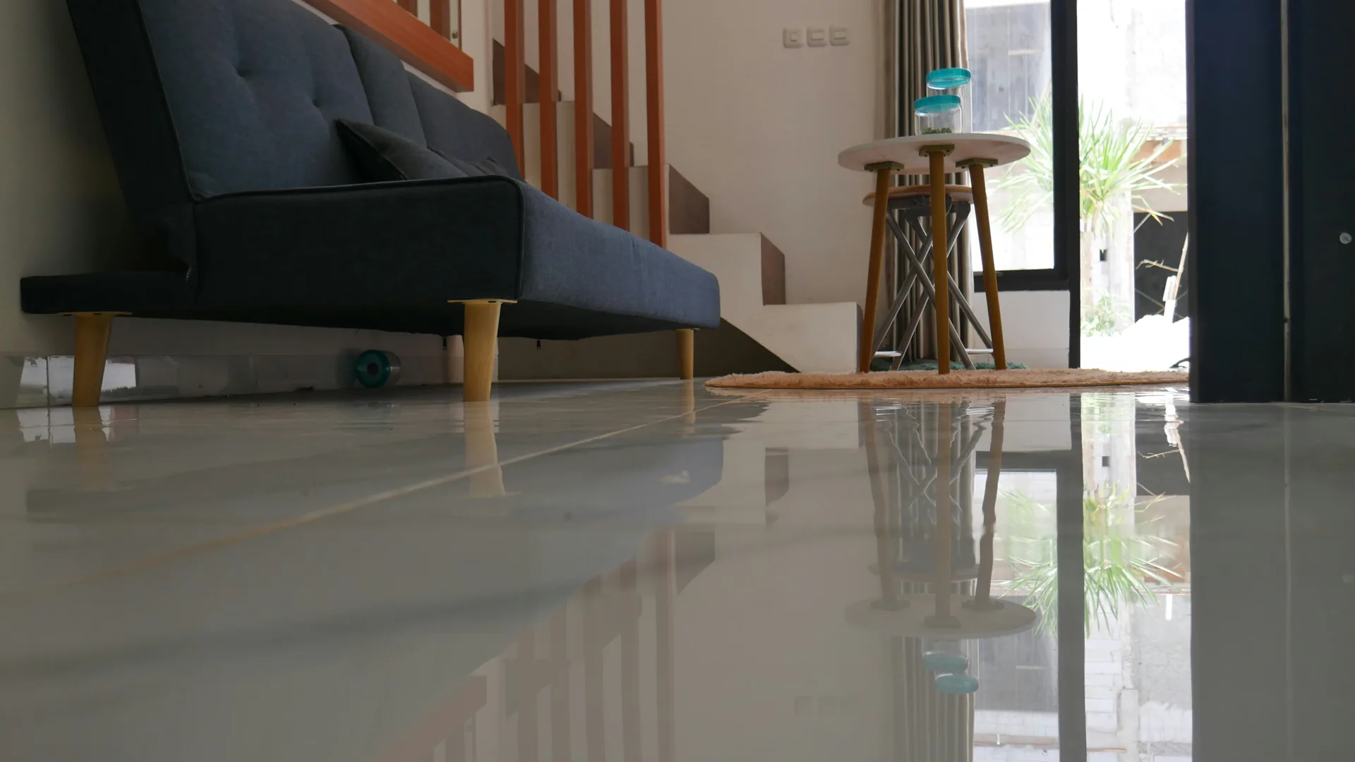 polished concrete floor reflecting light in a Gatineau living room