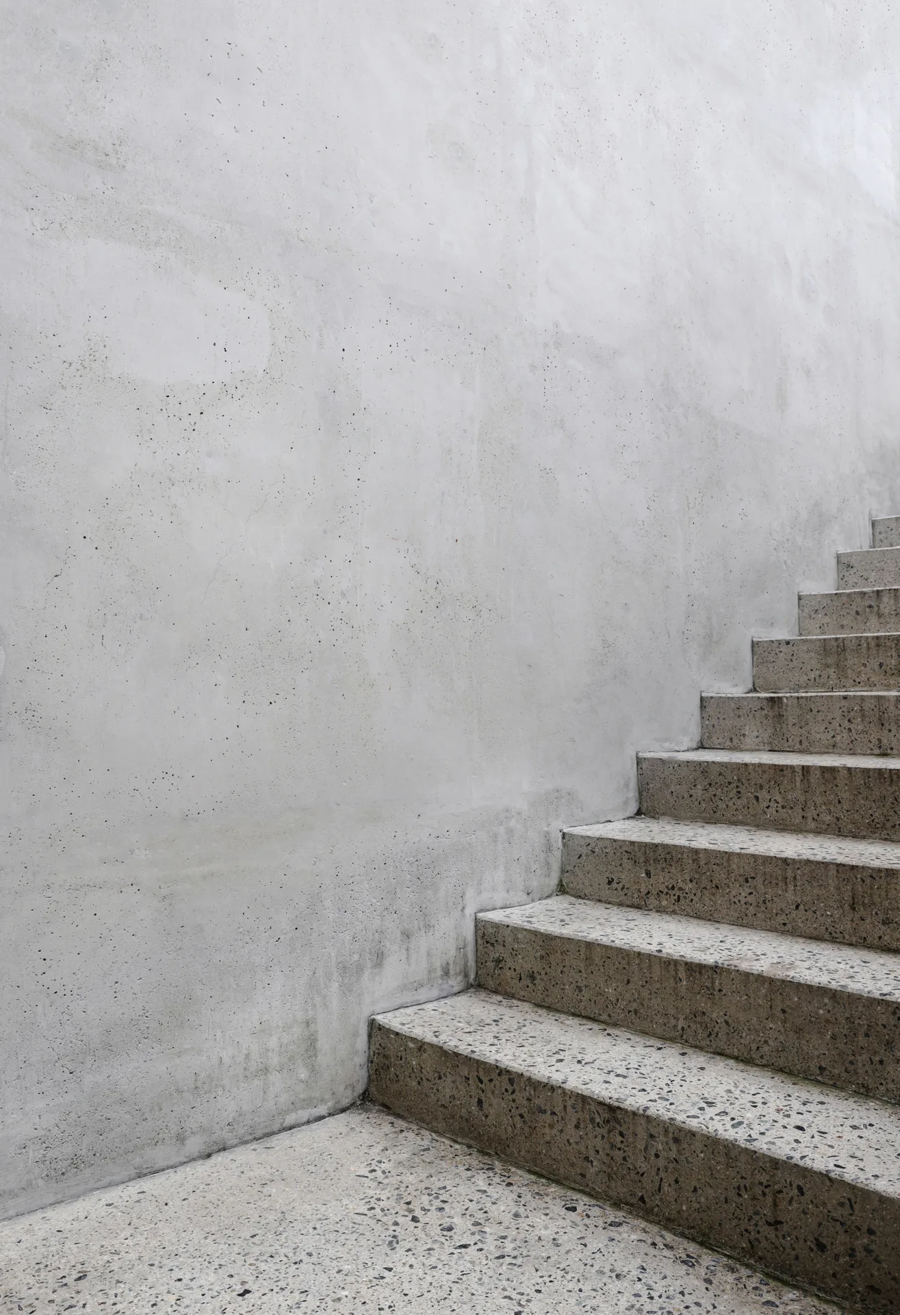 finished concrete front entry steps at a Gatineau home in winter